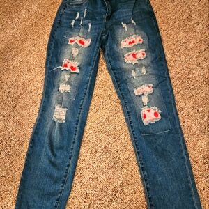 Blue jeans with heart details. Size 6